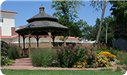 A gazebo surrounded by flowers